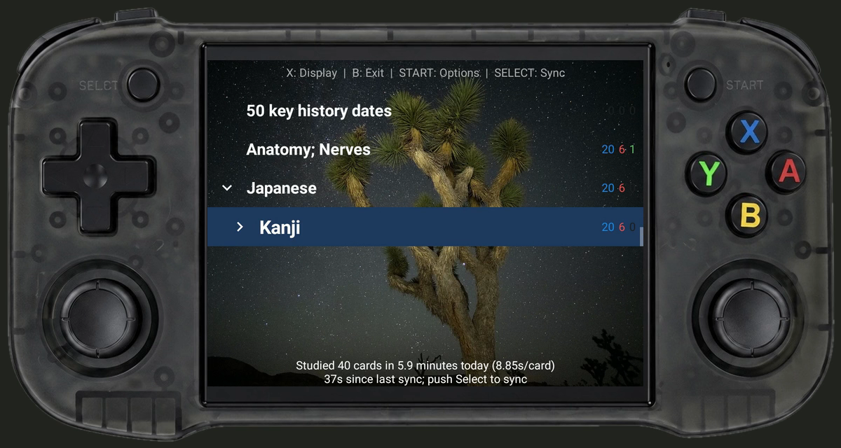 Ankiboy reviewing Kanji cards over a custom night-sky background